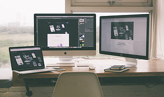 Modern Apple Workspace With Multiple Monitors And Laptop