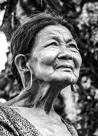 Black and White Portrait of Elderly Woman with Large Earrings