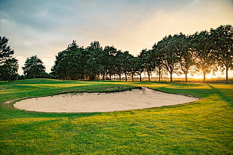 Sunlit Golf Course Sand Bunker at Sunset