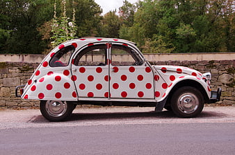 Vintage Citroën 2CV with Red Polka Dots