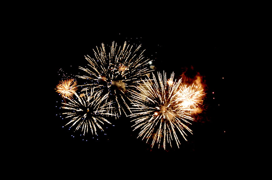Golden Fireworks Bursting in Night Sky