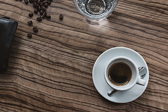 Top view of espresso coffee cup on wooden table