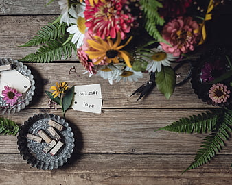 Rustic Flat Lay with Summer Flowers, Ferns, and Wooden Tags