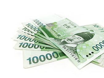 Fan of South Korean 10000 Won Banknotes on White Background