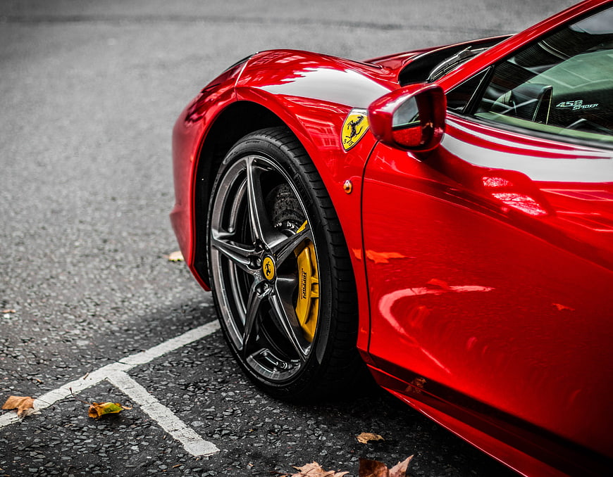 Close-up of Red Ferrari 458 Spider Wheel and Side Profile