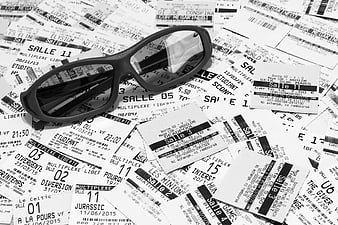 Black 3D Glasses on Scattered Cinema Tickets