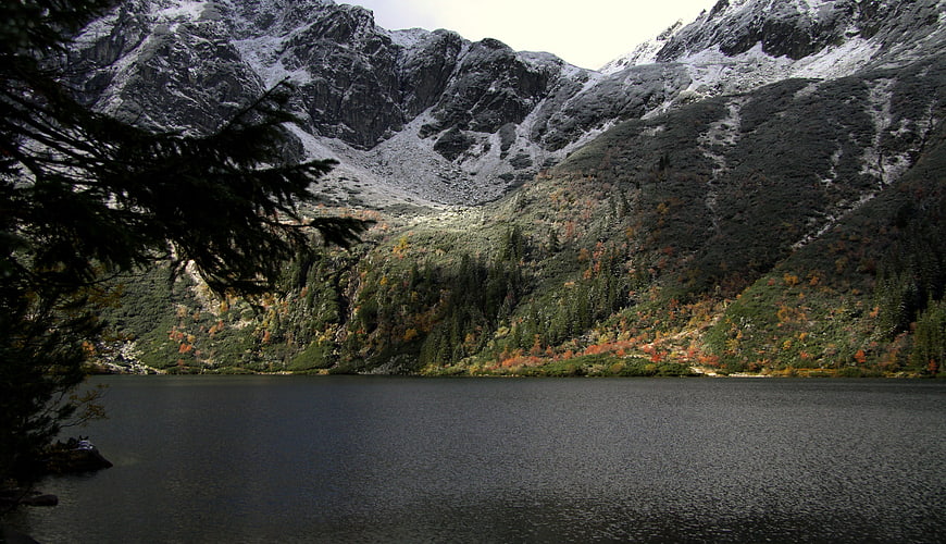 Snowy Mountain Peaks Over Autumn Lake in Tatra Mountains