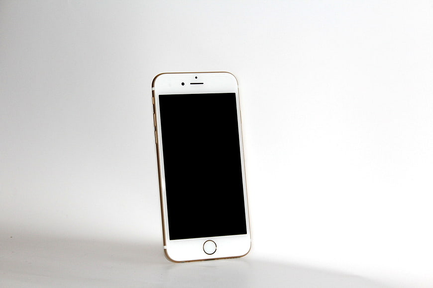 White Smartphone Mockup with Black Screen on White Background