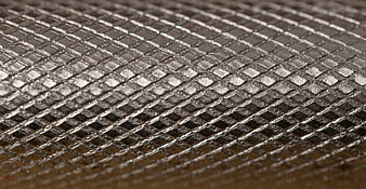 Close-up Macro Shot of Silver Metal Mesh Texture