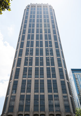 Low Angle View of Modern Glass Skyscraper