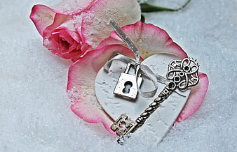 Vintage Key and Padlock on Heart with Pink Rose in Snow
