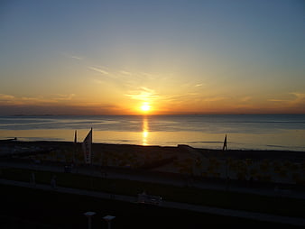Sunset over Cuxhaven Beach with Promenade and Sea
