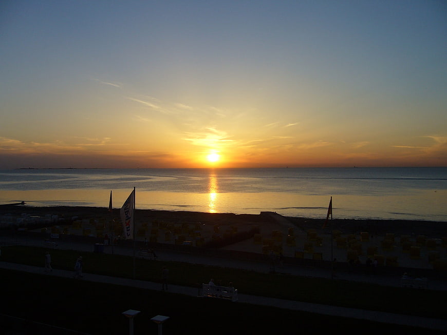 Sunset over Cuxhaven Beach with Promenade and Sea