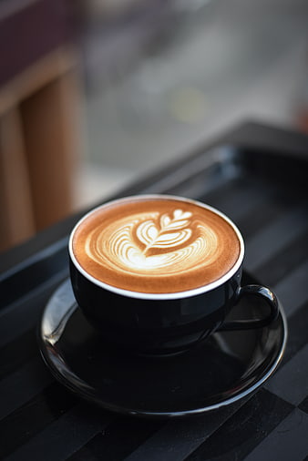 Latte Art Coffee Cup on Black Table