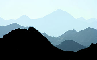 Silhouetted Mountain Ranges with Atmospheric Perspective
