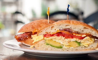 Close-up of Gourmet Breakfast Sandwiches with Avocado and Bacon