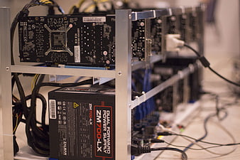 Cryptocurrency Mining Rig with Graphics Cards and Power Supply