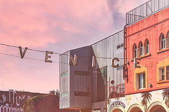 Vintage Venice Beach Sign Against Pink Sunset Sky