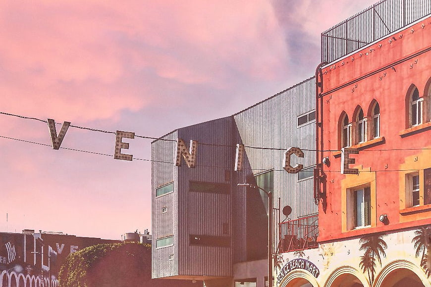 Vintage Venice Beach Sign Against Pink Sunset Sky