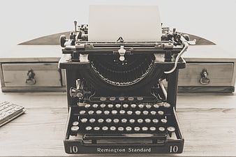 Vintage Remington Standard Typewriter on Wooden Desk