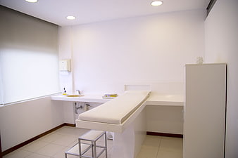 Clean White Medical Examination Room Interior