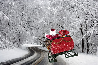 Santa Claus Flying Sleigh on Snowy Winter Road