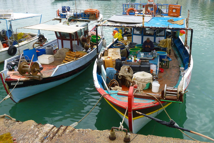 Colorful Fishing Boats Docked in Mediterranean Harbor