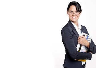 Smiling businesswoman holding documents against white background