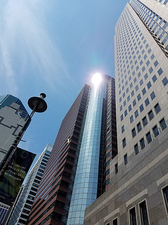 Low angle view of modern skyscrapers in downtown city