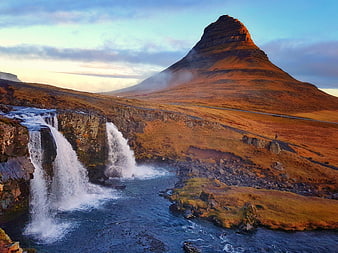 Kirkjufell Mountain and Waterfall in Iceland at Sunset