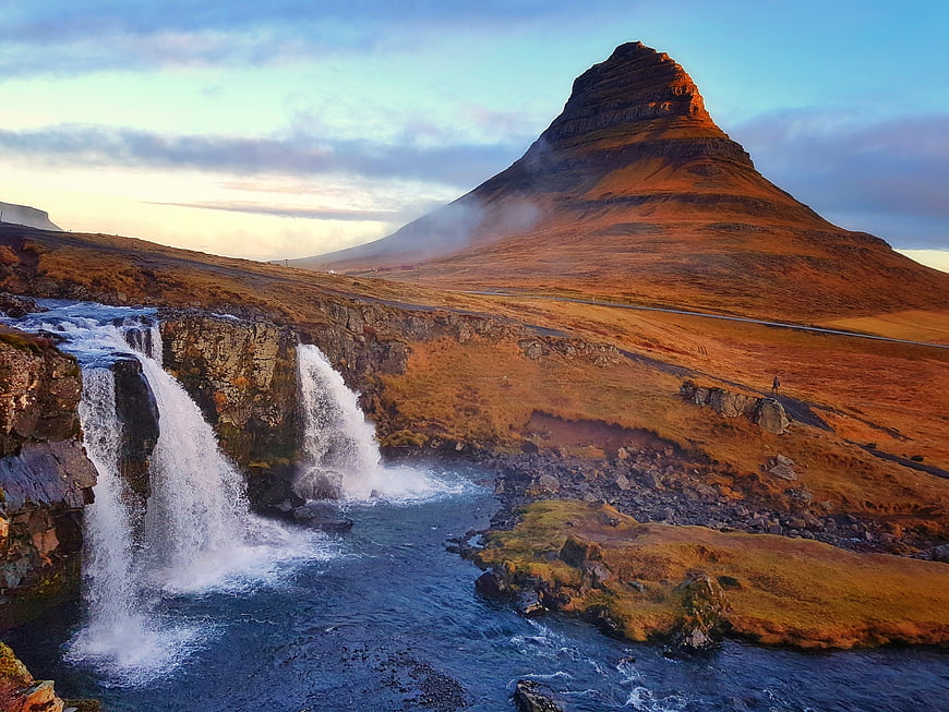 Kirkjufell Mountain and Waterfall in Iceland at Sunset