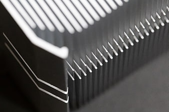 Close-up of black aluminum heat sink fins