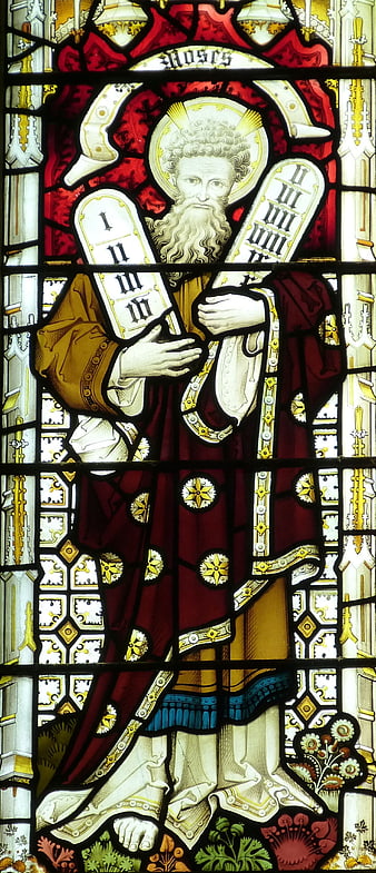 Stained Glass Window Depicting Moses Holding The Ten Commandments
