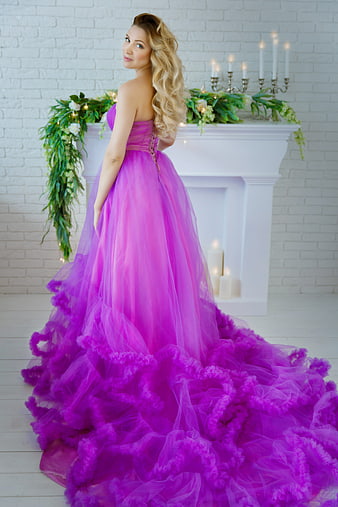 Blonde Woman in Vibrant Purple Tulle Gown