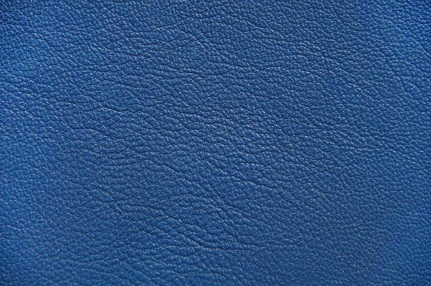 Close-up texture of blue leather material background