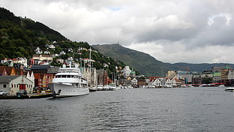 Bergen Harbor with Large White Yacht and Colorful Buildings