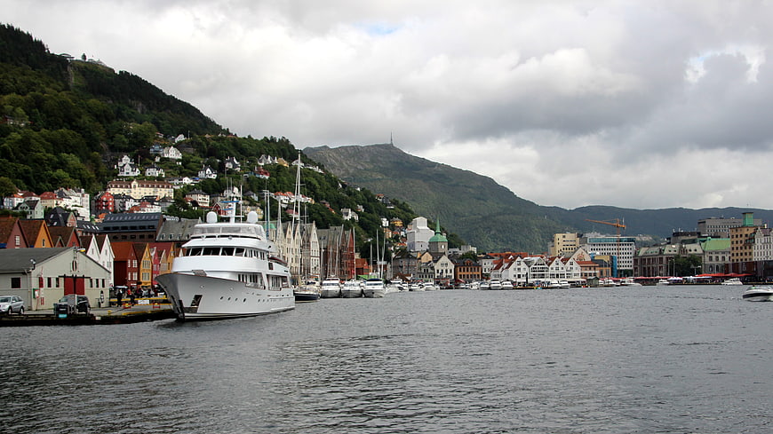 Bergen Harbor with Large White Yacht and Colorful Buildings