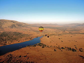 Hot Air Balloon Safari Over African Savanna Landscape