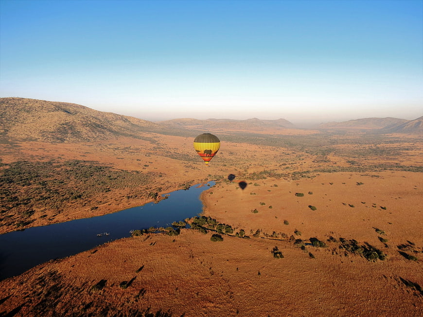Hot Air Balloon Safari Over African Savanna Landscape