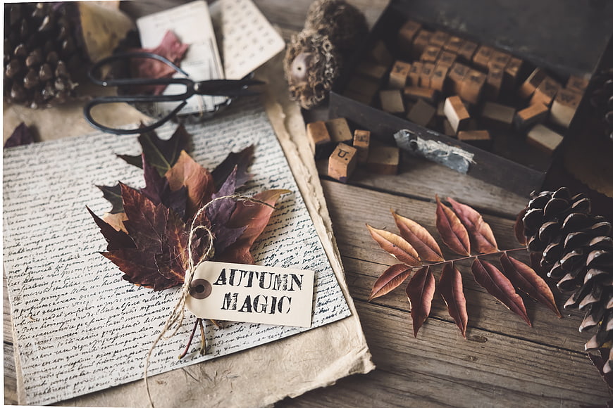 Autumn Magic Flat Lay with Vintage Letterpress Blocks and Dried Leaves