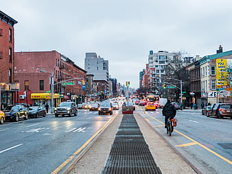 Brooklyn Street Scene with Cyclist and Traffic