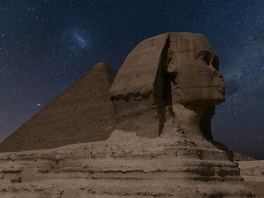 Great Sphinx of Giza and Pyramid Under Starry Night Sky