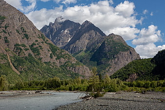 Majestic Alaska Mountain Landscape with River and Clouds