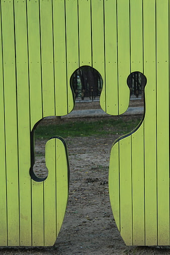 Abstract Green Wooden Sculpture in Park