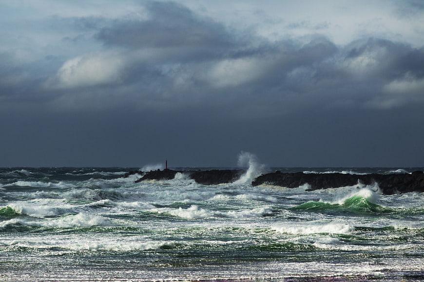 Stormy Ocean Waves Crashing Against Rocky Coastline