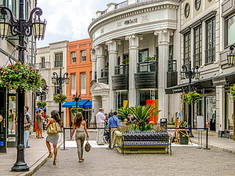 Luxury Shopping Street with Versace Store and Pedestrians