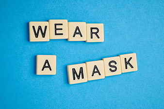 Wear A Mask Text on Blue Background