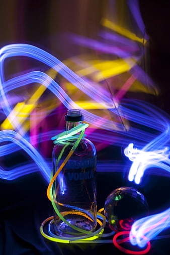 Absolut Vodka Bottle With Neon Light Trails And Disco Ball