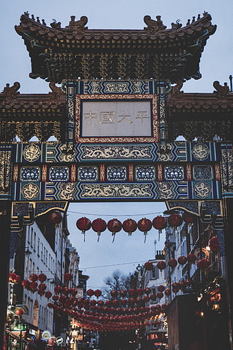 Traditional Chinese Archway with Red Lanterns in Chinatown