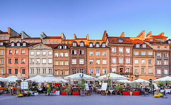 Historic Old Town Facades With Outdoor Cafes In Poland